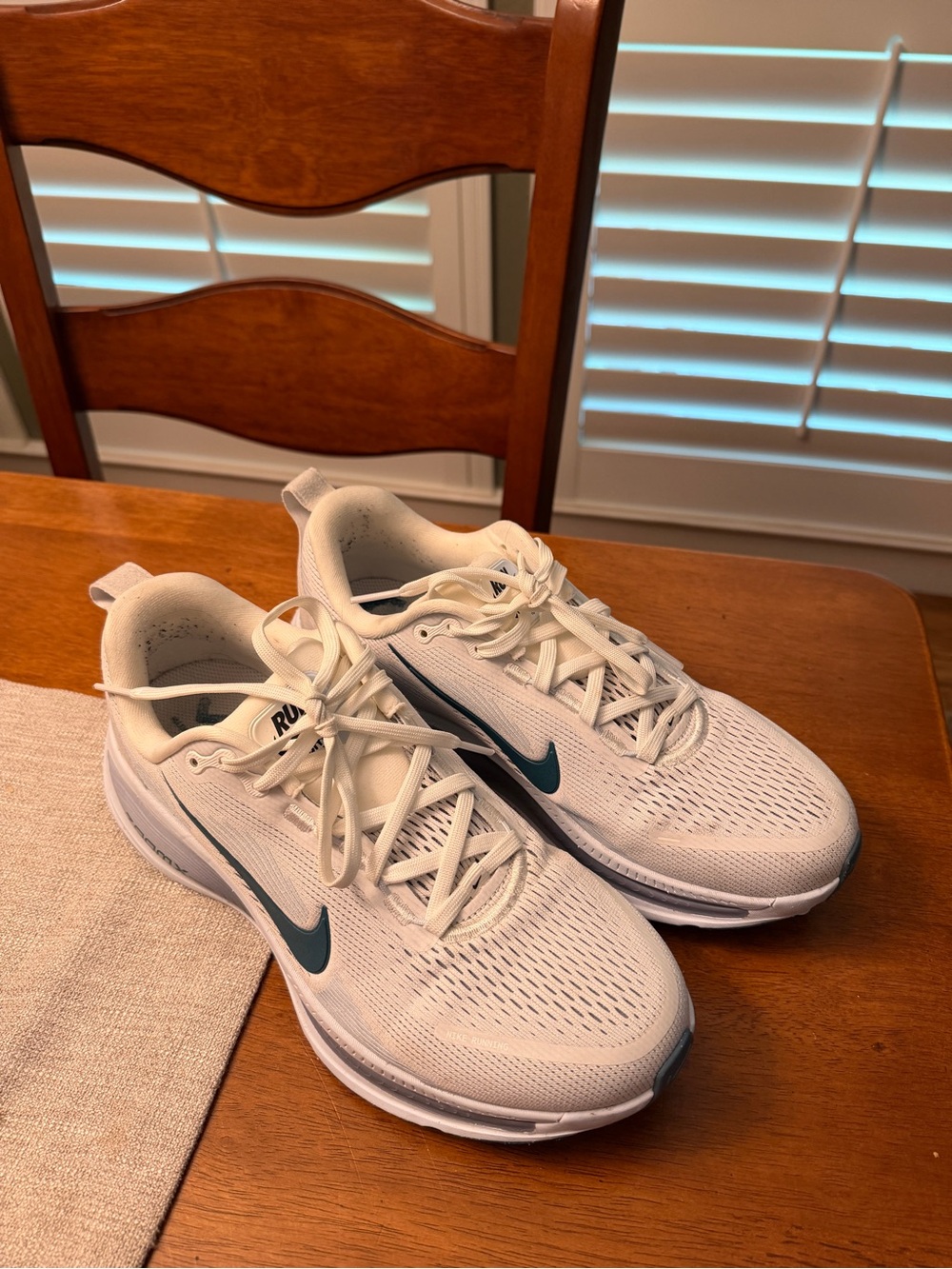 Nike women’s  White Running Shoes with Teal Swoosh